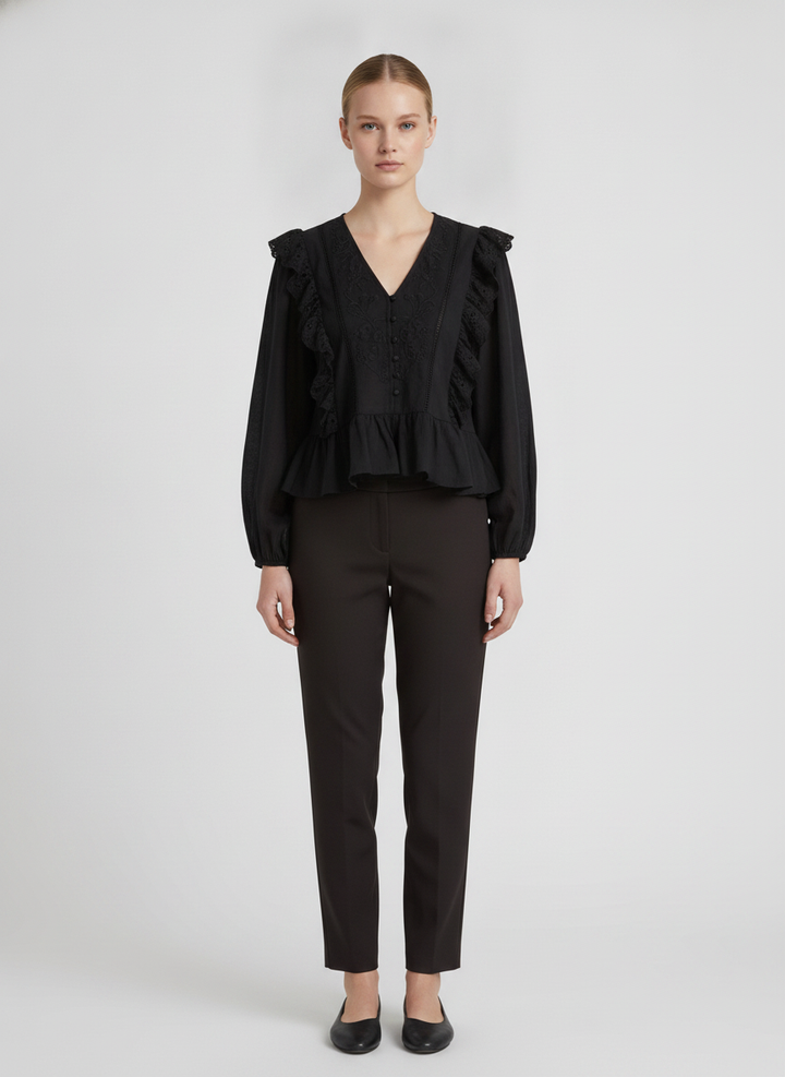 Ophira | Cutwork Lace Peplum Blouse — Black (front)