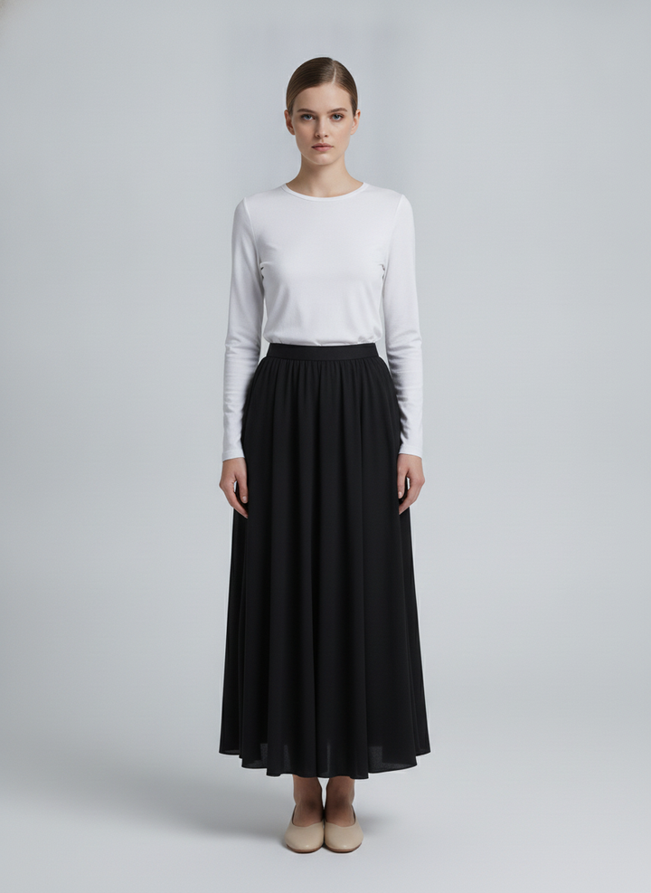 Elsa | Pleated A-Line Maxi Skirt — Black (front)