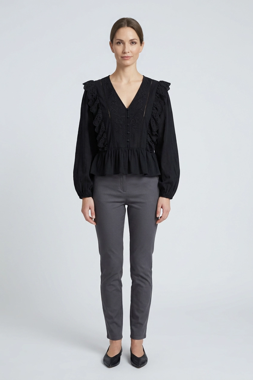 Ophira | Cutwork Lace Peplum Blouse — Black (front)
