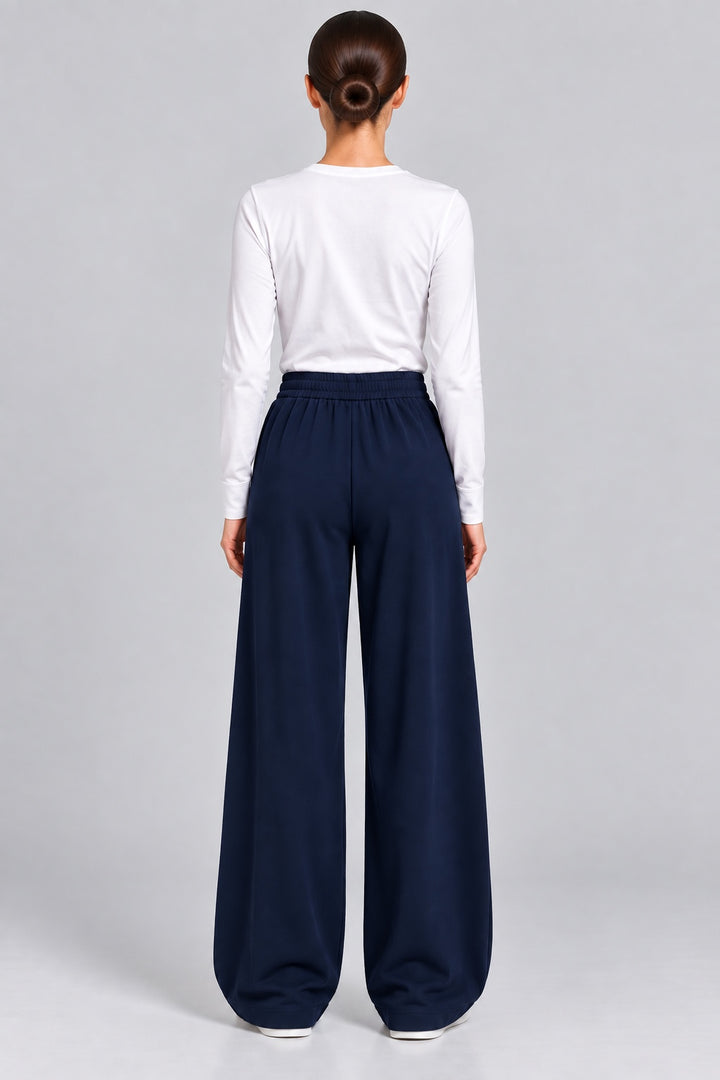 Flint | Pleated Tapered Trousers — Navy (back)