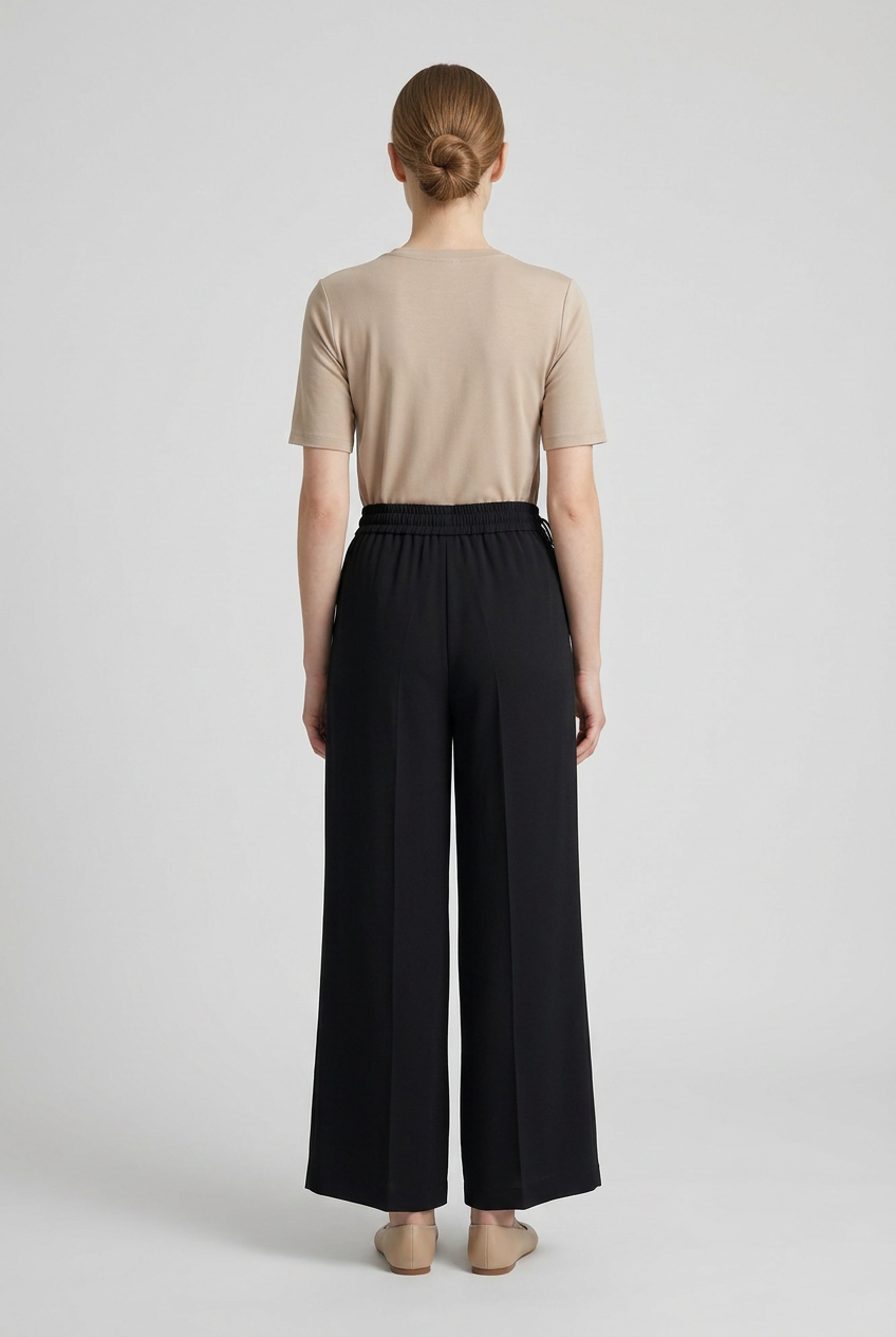 Marlene | Pleated Wide-Leg Trousers — Black (back)
