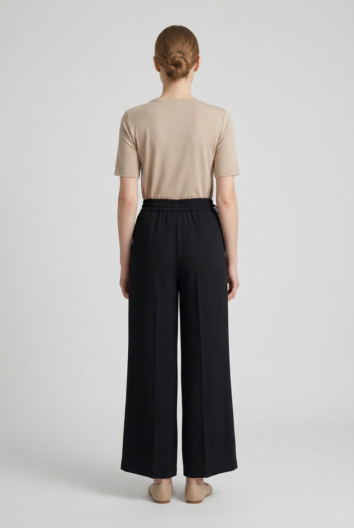 Marlene | Pleated Wide-Leg Trousers — Black (back)
