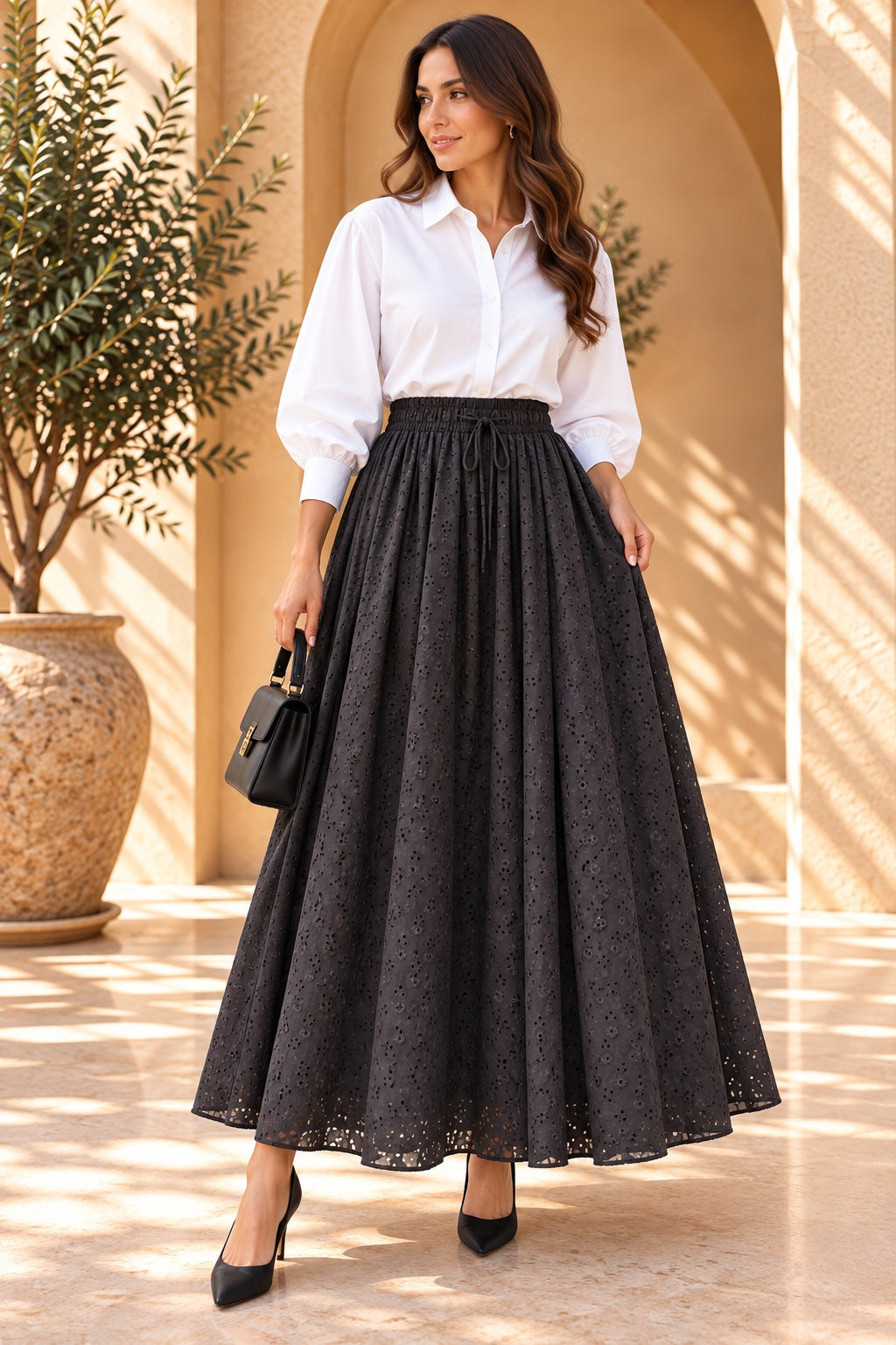 Ebony | Eyelet Maxi Skirt — Black (front)