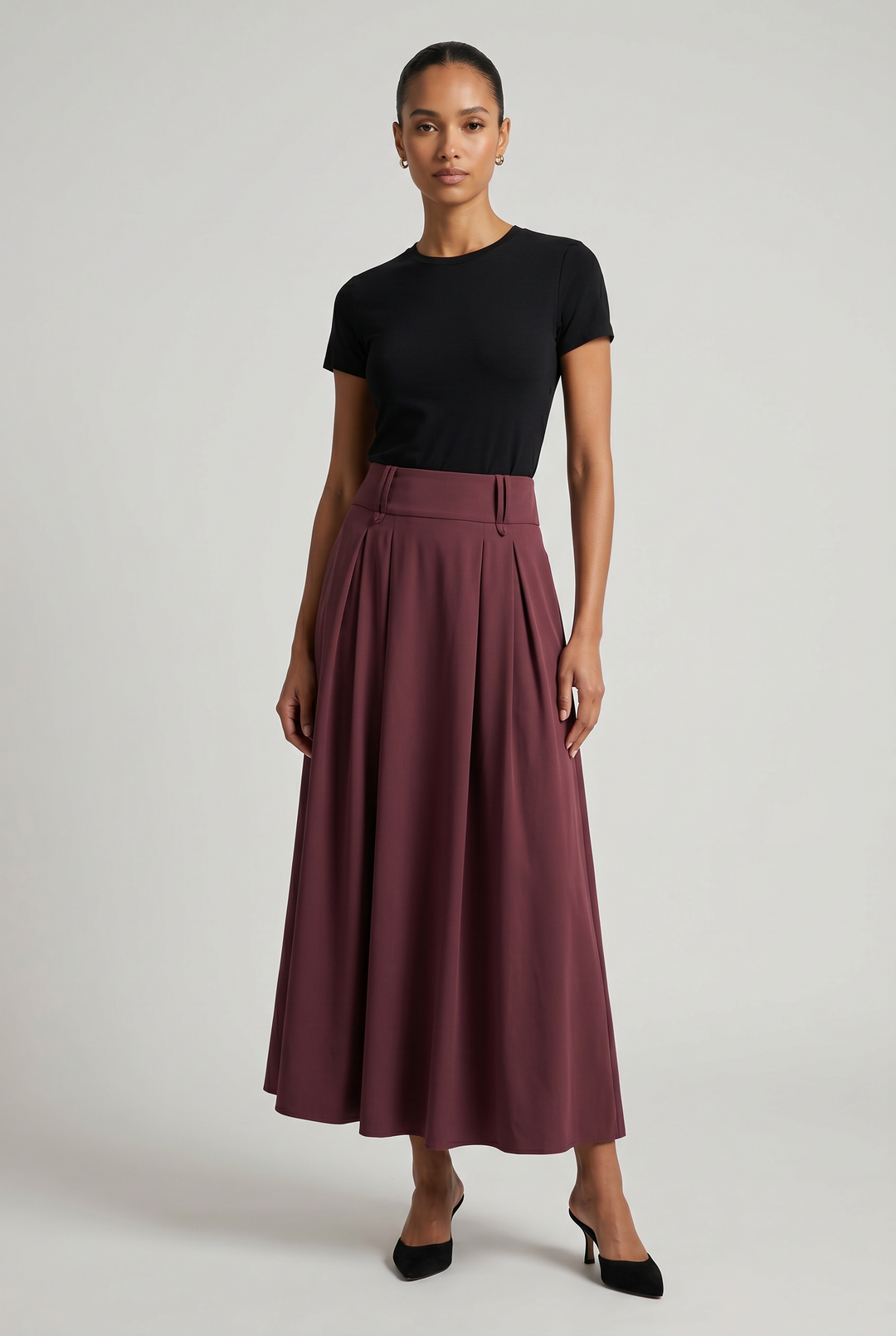 Model wearing Quinn | Pleated Belted Maxi Skirt